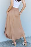 Doublju Comfort Princess Full Size High Waist Scoop Hem Maxi Skirt in Tan - Ajonjolí&Spice33 Bazaar